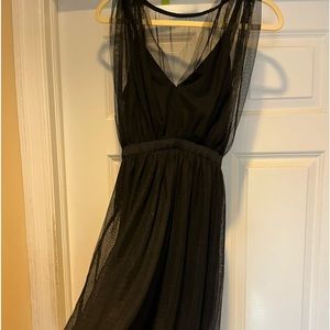 Women’s black maxi dress with black mesh layering over short slip dress